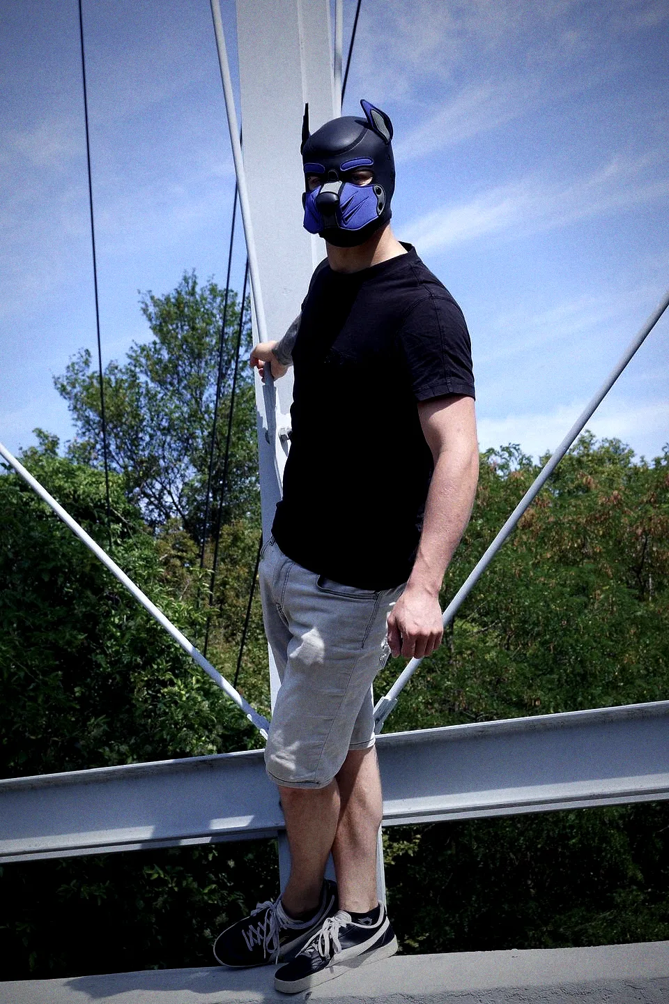 Standing on a steel beam under a blue sky